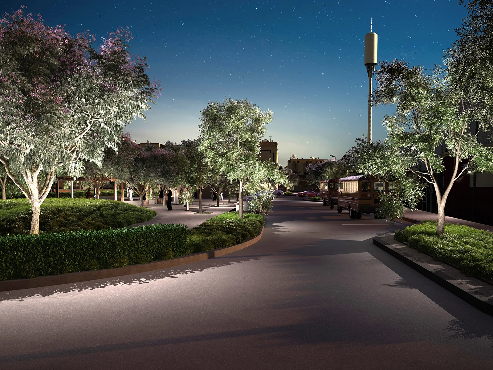 Night visual of a planted street in East An Naseem, trees lit from below