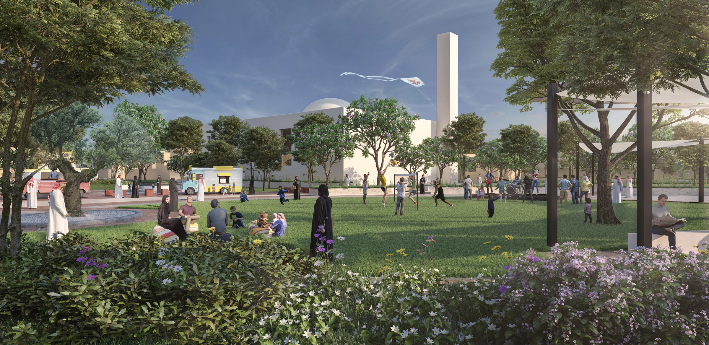 Visual of the events lawn beside the mosque, with families picnicking, a volleyball game and a small stage